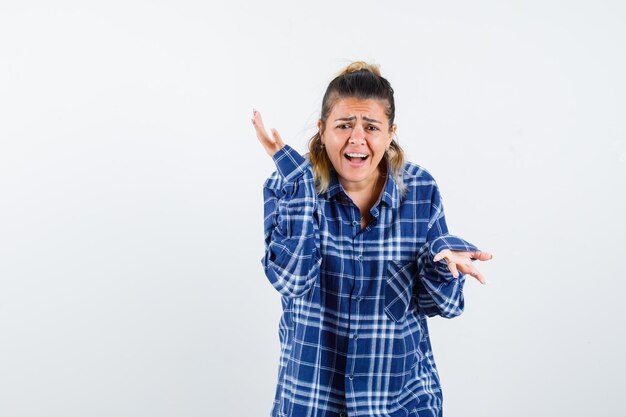 Expressive young girl posing in the studio