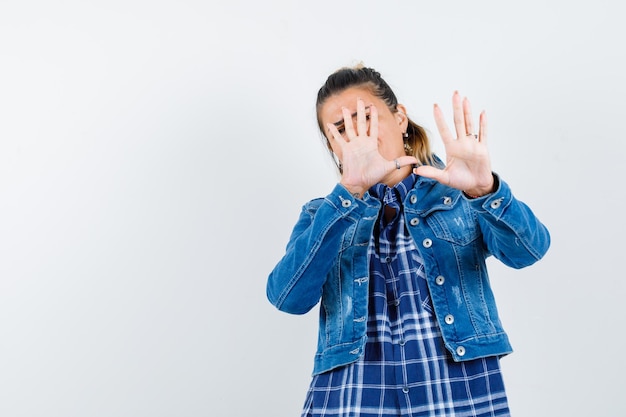 Expressive young girl posing in the studio