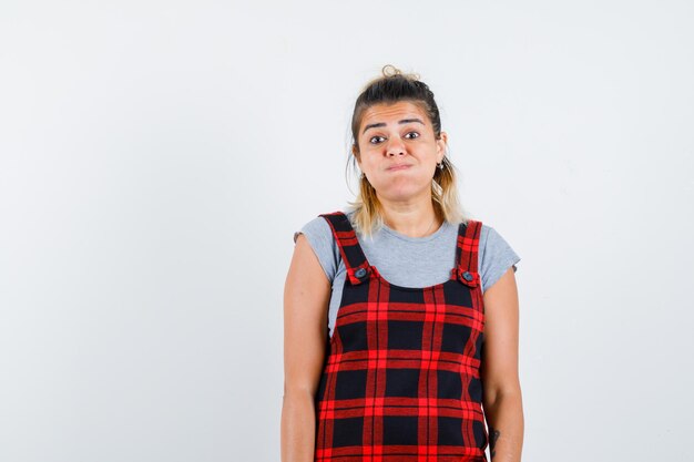 Expressive young girl posing in the studio