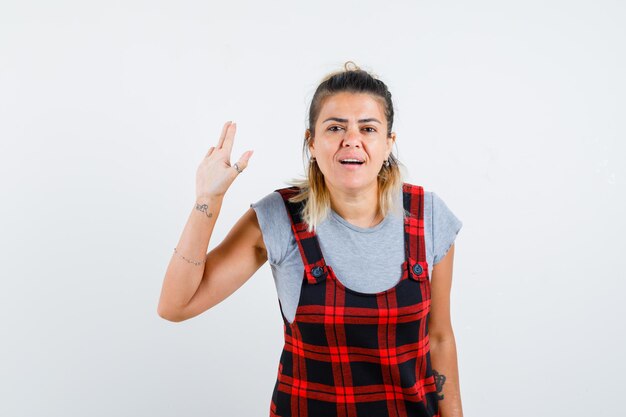 Expressive young girl posing in the studio