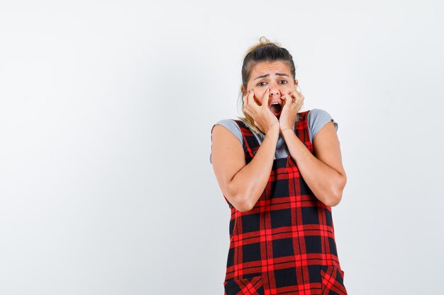 Expressive young girl posing in the studio