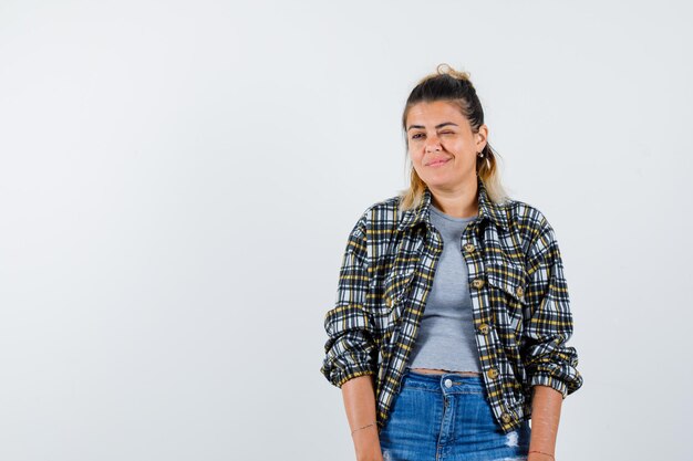 Expressive young girl posing in the studio