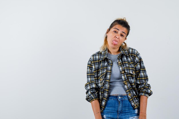 Expressive young girl posing in the studio