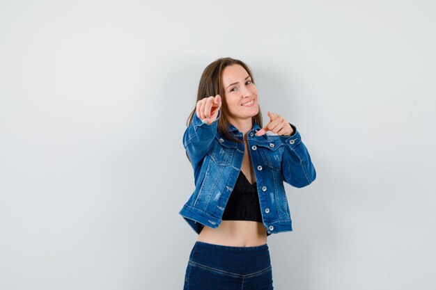 Expressive young girl posing in the studio