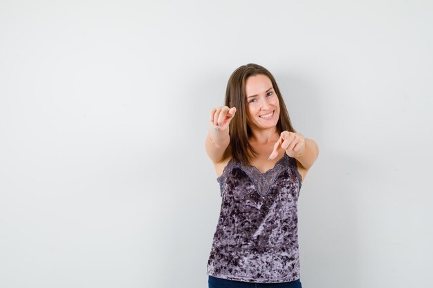 Expressive young girl posing in the studio