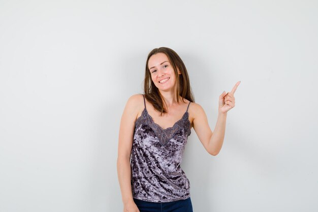 Expressive young girl posing in the studio