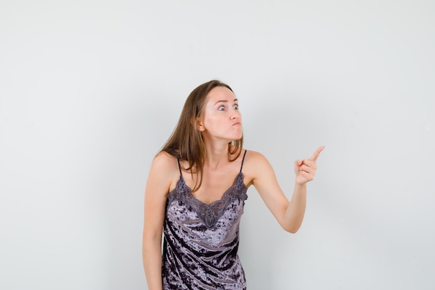 Expressive young girl posing in the studio