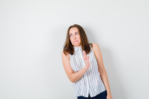 Expressive young girl posing in the studio