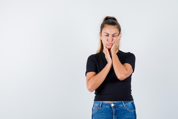 Expressive young girl posing in the studio