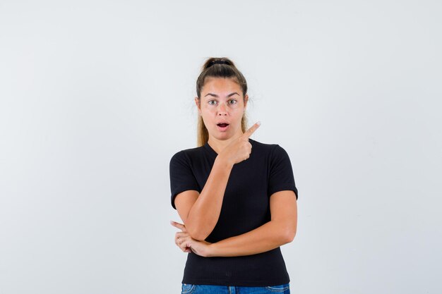 Expressive young girl posing in the studio