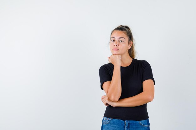 Expressive young girl posing in the studio