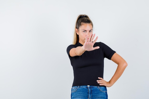 Expressive young girl posing in the studio