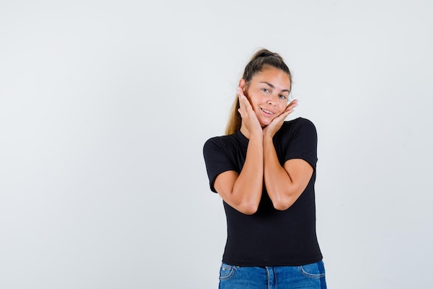 Expressive young girl posing in the studio