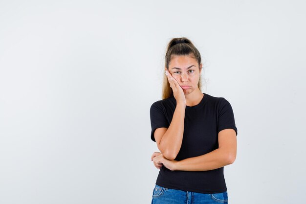 Expressive young girl posing in the studio