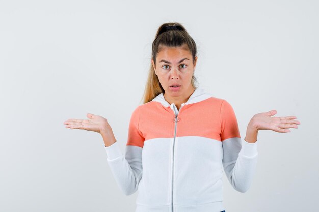 Expressive young girl posing in the studio