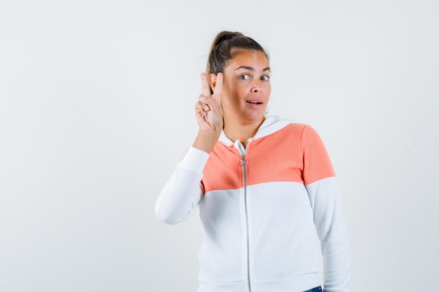 Expressive young girl posing in the studio