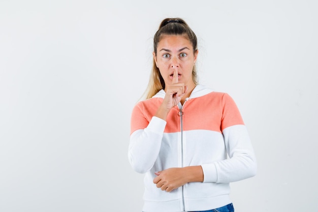 Expressive young girl posing in the studio