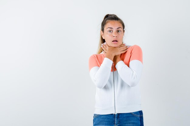 Expressive young girl posing in the studio