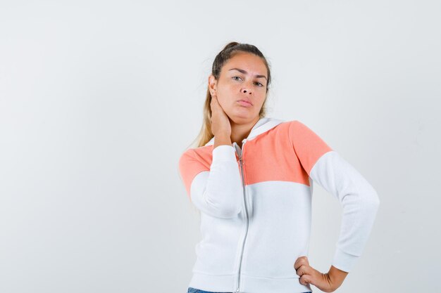 Expressive young girl posing in the studio