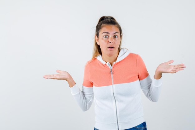 Expressive young girl posing in the studio