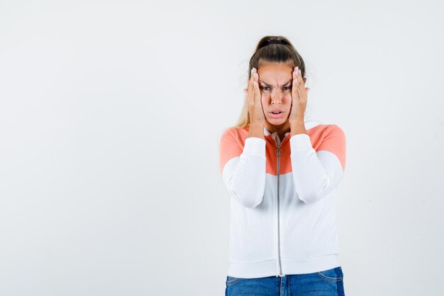 Expressive young girl posing in the studio