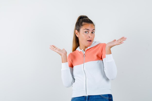 Expressive young girl posing in the studio