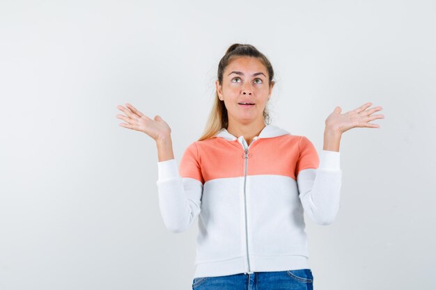 Expressive young girl posing in the studio