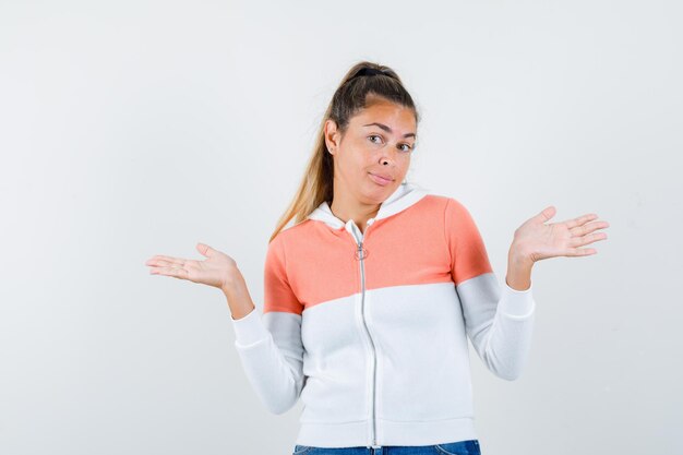 Expressive young girl posing in the studio