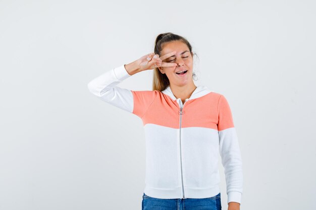 Expressive young girl posing in the studio