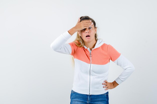 Expressive young girl posing in the studio