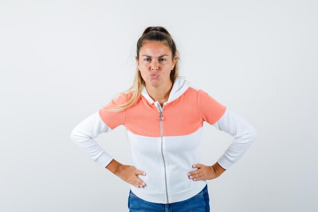 Expressive young girl posing in the studio