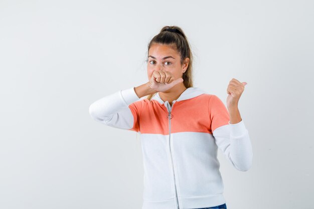 Expressive young girl posing in the studio