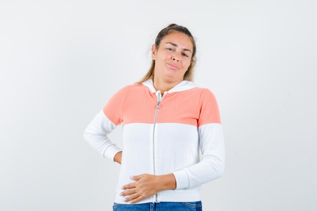 Expressive young girl posing in the studio