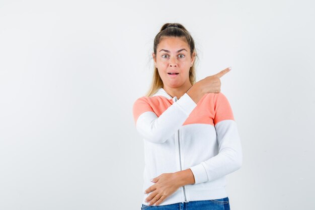 Expressive young girl posing in the studio