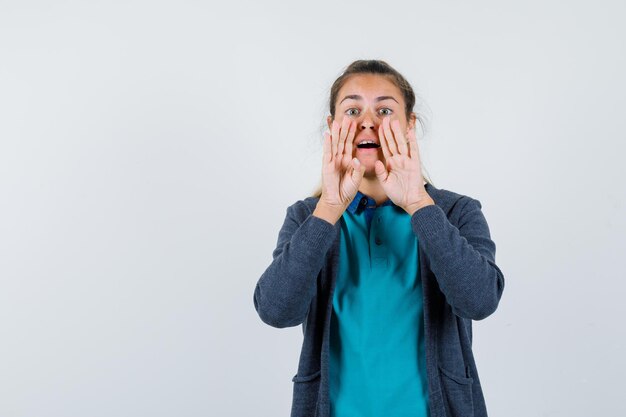 Expressive young girl posing in the studio