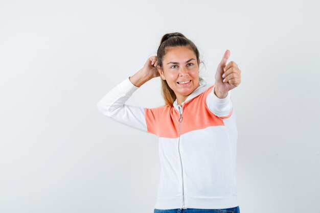 Expressive young girl posing in the studio