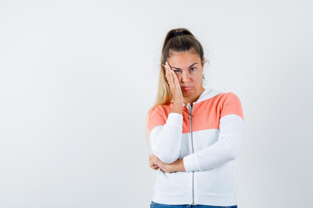 Expressive young girl posing in the studio