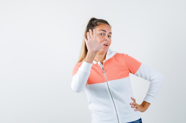 Expressive young girl posing in the studio