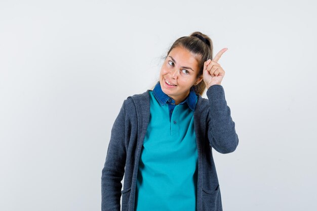 Expressive young girl posing in the studio