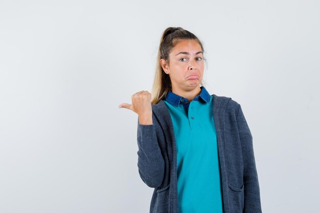 Expressive young girl posing in the studio