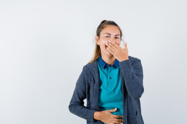 Expressive young girl posing in the studio