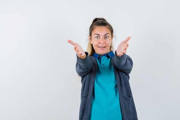 Expressive young girl posing in the studio