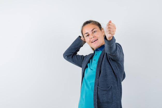 Expressive young girl posing in the studio