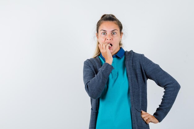 Expressive young girl posing in the studio