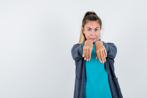 Expressive young girl posing in the studio