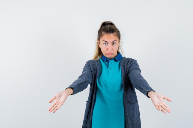 Expressive young girl posing in the studio