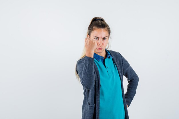 Expressive young girl posing in the studio