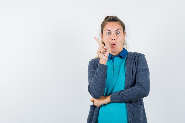 Expressive young girl posing in the studio