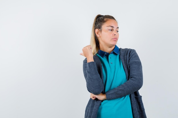 Expressive young girl posing in the studio