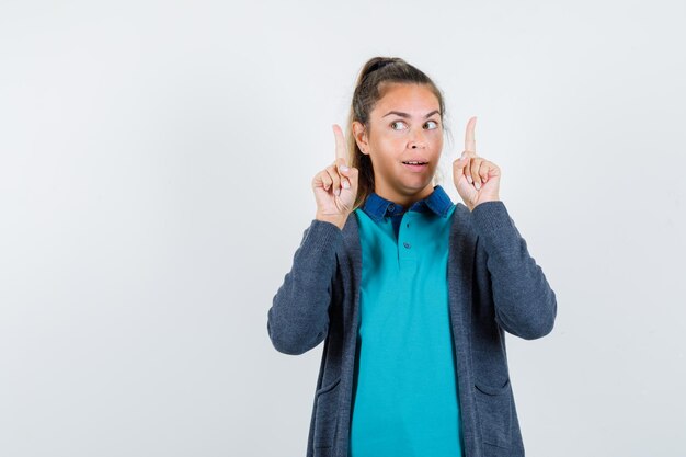 Expressive young girl posing in the studio